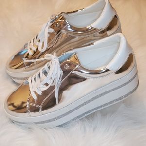 Silver and white platform shoes